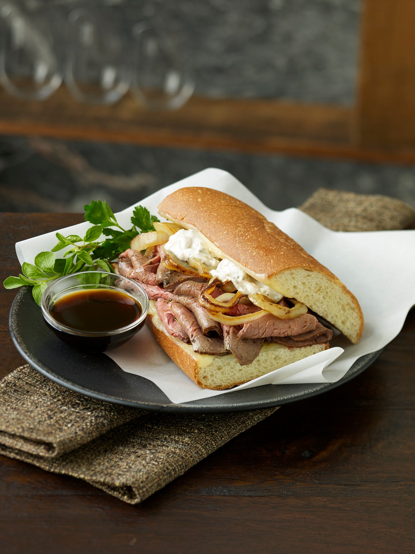 Roast Lamb Leg “French Dip” with Caramelized Onions & Greek Yogurt Sauce